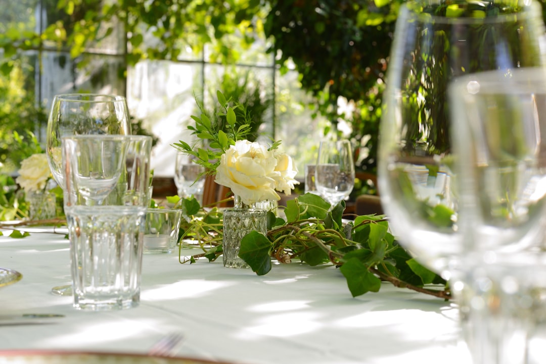 A festive wedding table in an evening mood greenhouse setting.